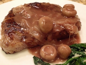 recipe for garlic marinated steaks with savory mushroom sauce