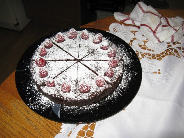 photo of 411's Raspberry Black Satin Fudge Cake With Raspberry Sauce
