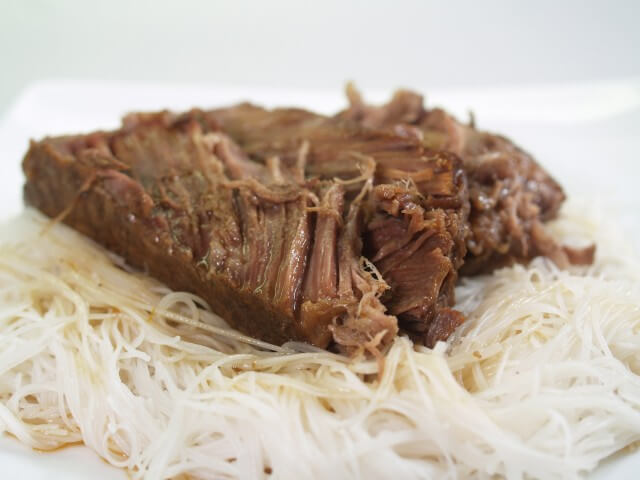 photo of Chinese Plum Sauce And Soy Pot Roast Over Noodles