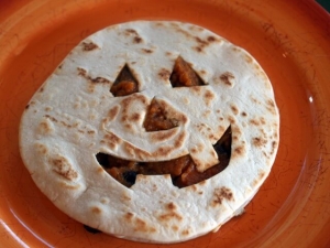 recipe for jack 'o lantern quesadillas with chipotle-maple pumpkin and black beans