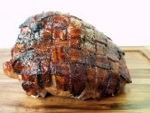 view the recipe for Sweet And Spicy Bacon Wrapped Turkey Breast
