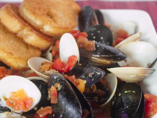 photo of Little Neck Clams And Mussels In A Spicy Broth