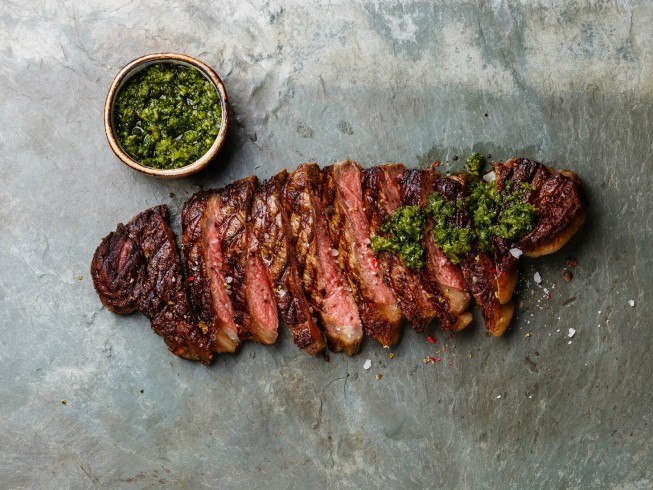photo of Flank Steak with Lemon Butter and Chimichurri Sauce
