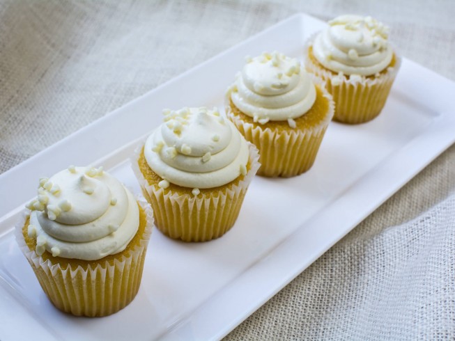 Exquisite White Cupcakes With Delicate Icing