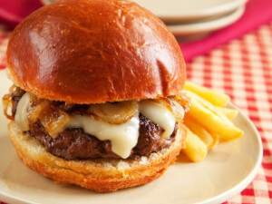 recipe for bratwurst burgers with beer-soaked onions