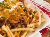 view the recipe for Slow Cooker Cheesy Chili
