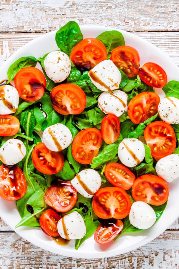 Baby Spinach Salad with Tomato and Mozzarella Recipe | CDKitchen.com