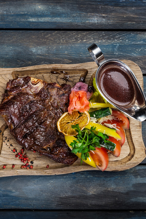 Sliced Porterhouse Steak With Bourbon Sauce Recipe
