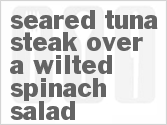 recipe for seared tuna steak over a wilted spinach salad