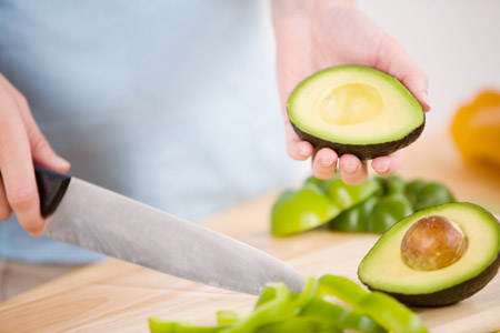 Twist the avocado into two halves